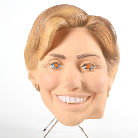 vintage 2003 Hillary Clinton latex full face mask shown on wig stand on white background