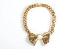 Vintage 1990s Gold Pearl Bow Pendant Bold Chain Necklace | by Nina Ricci
