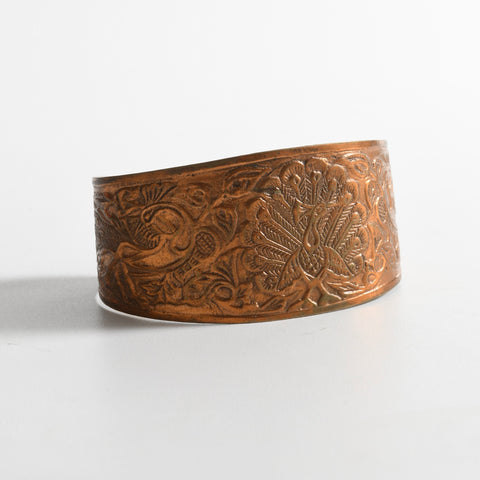 vintage 1970s copper colored metal peacocks adjustable cuff with full display center peacock and side peacocks with feathers down
