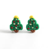 true vintage 80s green christmas tree plastic grid yarn hadmade stud earrings with yellow star shown on white background