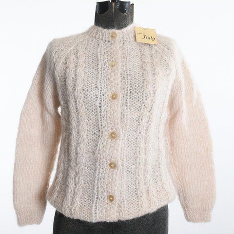 vintage 1950s cream wool mohair cardigan knit sweater with original gold paper "made in italy" label hanging over left shoulder shown on dress form with with background