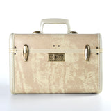 vintage 1960s beige cream travel train case by samsonite with gold latch hardware and cream handle shown on white background