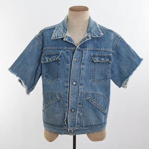true vintage 1960s J.C. Penney's Foremost short cut off sleeve denim jacket with 4 front pockets shown on dress form with white background
