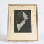 true vintage 1930s side angled silhouette woman portrait with cream art deco design matte with silver and black deco lines and natural wood narrow frame shown on white bacground