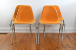 Vintage 1970s Orange Off White Fiberglass Eames DSS Stacking Side Chairs Set of 4 | by Herman Miller