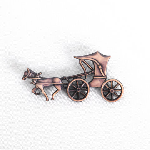 true vintage 1940s pink and purple covered horse drawn carriage celluloid brooch showing lying flat on white background