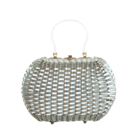 true vintage blue metallic frosted plastic coated wicker weave curved sides purse with pearlized lucite handle and gold hardware shown on white background