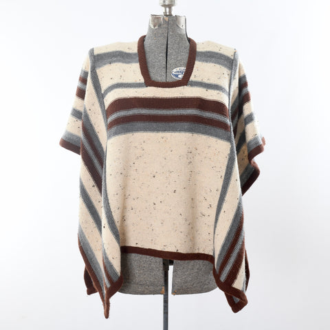 true vintage 1970s cream gray brown geometric striped rectangular poncho shown on dress form on white background