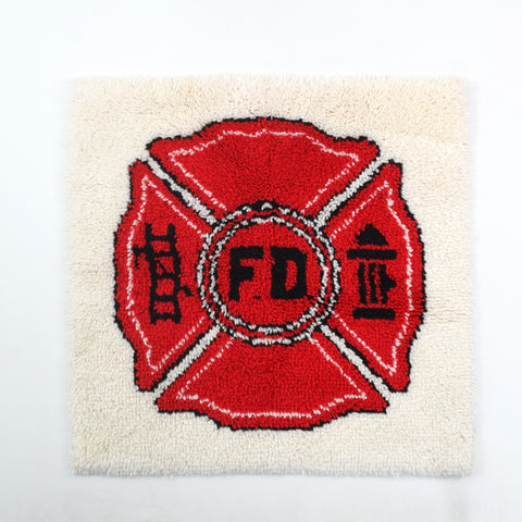 true vintage 1970s white square latch hook fire department badge theme rug shown on white background