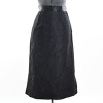 true vintage 1950s black fan pattern lace midi pencil skirt shown on dress form against white background