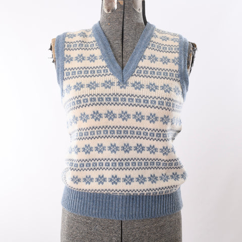 True vintage 1980s dusty blue white Norwegian design sweater vest shown on dress form against white background