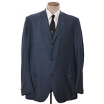 true vintage 1960s blue sharkskin 3 button sports jacket shown with black tie and white shirt on dress form against white background