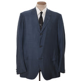 true vintage 1960s blue sharkskin 3 button sports jacket shown with black tie and white shirt on dress form against white background