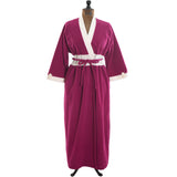 true vintage 1980s fuschia purple and white trim robe shown on dress form against white background