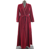 true vintage 1970s maroon red with white piping tie front long sleeve fleece robe shown on dress form in center image with white background