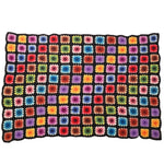 true vintage black trim wool multi colored granny square handmade afghan blanket throw shown lying flat like a rectangle on white background