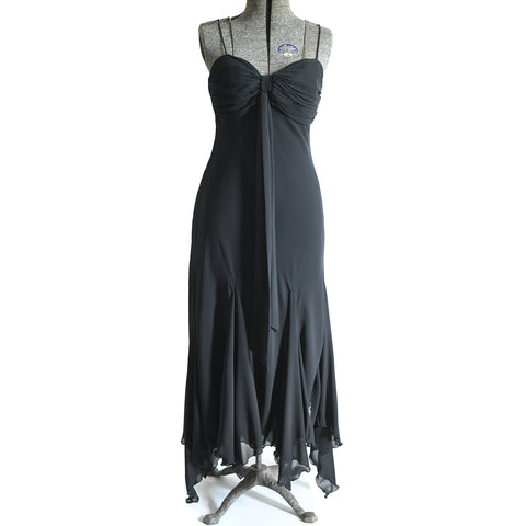 1990s black flowing sleeveless sweetheart gathered bust dress with handkerchief hem shown on dress form against white background