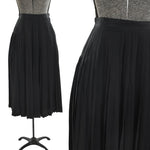 true vintage 80s black accordion pleated midi silk skirt shown on dress form left image and close up of waist pleating right image all on white background