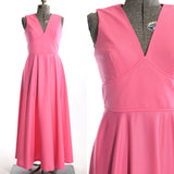 vintage 1970s bubblegum pink sleeveless v neck maxi dress shown on dress form left image and close up of bodice on right image shown on white background