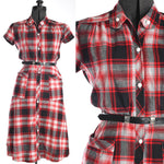 true vintage 1940s red black white plaid short sleeve midi day dress with large plaid hip pockets shown on dress form right image and close up of bodice right image all on white background