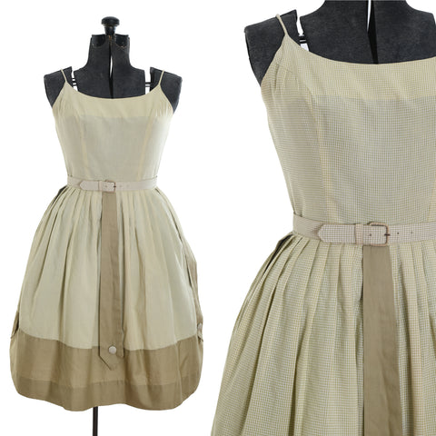 true vintage late 1950s early 1960s sage green spaghetti strap sleeveless sundress with full skirt and 3 long necktie like skirt accents shown on dress form left image and close up of bodice skirt details right image all on white background
