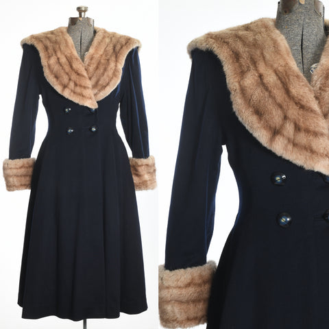 true vintage 1940s navy blue double breasted princess cut coat with scooped beige fur collar and fur cuffs shown on dress form left image and close up of bodice right image with white background