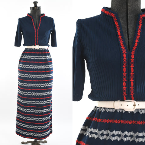 true vintage 1970s navy blue half sleeve maxi dress with red and white zig zag skirt pattern shown on dress form left image with close up of bodice right image all on white background