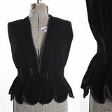 antique victorian black velvet ladies waist coat with scalloped hem and black braid piping and velvet gathered waist ribbon shown on dress form right image with close up of waist side and bottom scalloping right image all on white background