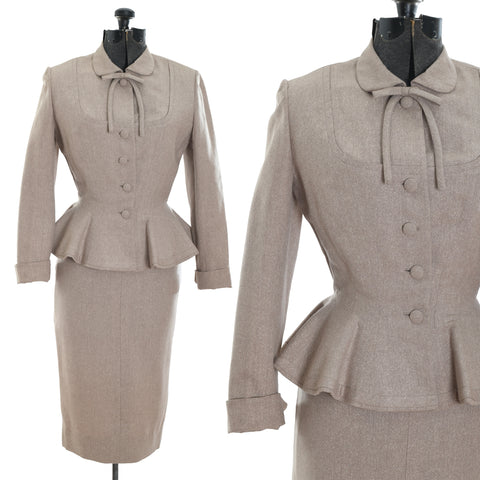 true vintage oatmeal brown wool wasp waist peplum long sleeve skirt suit with neck bow shown on dress form left image with close up of bodice right image all on white background