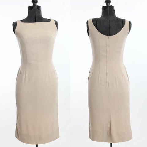 vintage late 1950s early 1960s beige sleeveless wiggle dress shown on dark dress form front of dress left image with back of dress on dress form right image all on white background