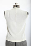 Vintage 1960s Cream Bouclé Knit Navy Tiki Print Sleeveless Shirt  |  Large  |  by Talbott Travler