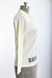 Vintage 1960s Cream Bouclé Knit Navy Tiki Print Cardigan Sweater  |  Large  |  by Talbott Travler