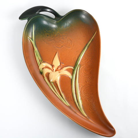 vintage 1940s green and orange brown pepper shaped platter with pale yellow lilly and art deco swirls 