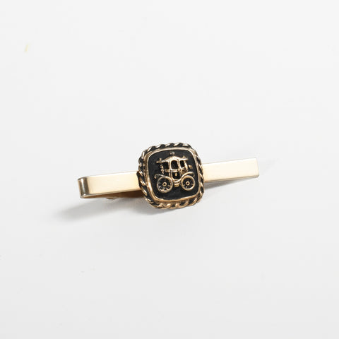 vintage 1950s royal carriage tie bar shown on white background