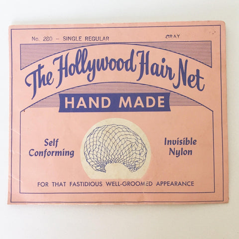 vintage 1940s gray hair net in original pink packaging by The Hollywood hair Net in nylon