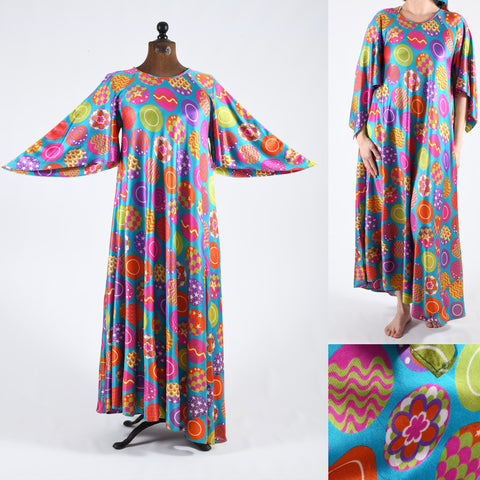 vintage 1960s bright jewel tones psychedelic hostess gown with blue background, circles all over with stars, flowers, swirls