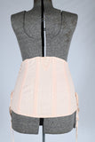 vintage 30s 40s peach cotton steel boned corset with garters and side lace string draws on dress form back view