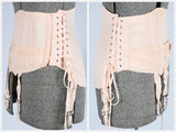 vintage 30s 40s peach cotton steel boned corset with garters and side lace string draws on dress form side view