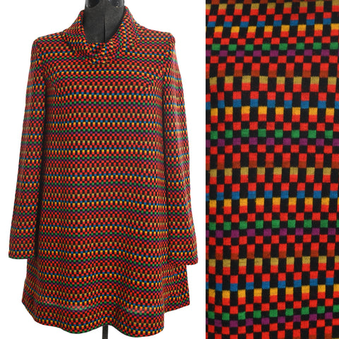 vintage 1960s rainbow colored tent mini dress with vertical stripes broken up in to squares and rectangles by black rectangles and squares